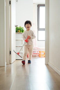 Little Asian girl at home