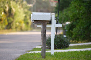 Typical american outdoors mail box on suburban street side