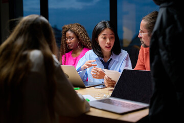 Co-workers, discussing, project, overtime, office,