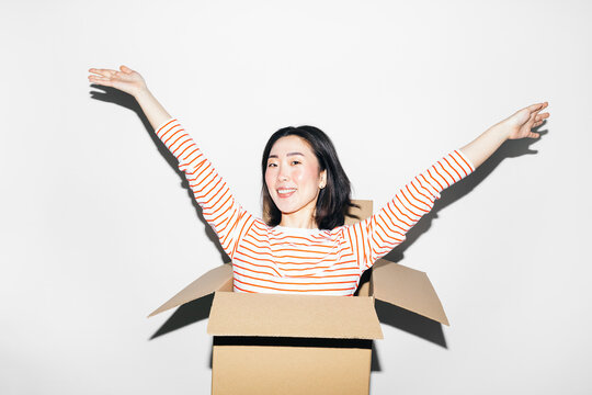 Woman in Cardboard Box