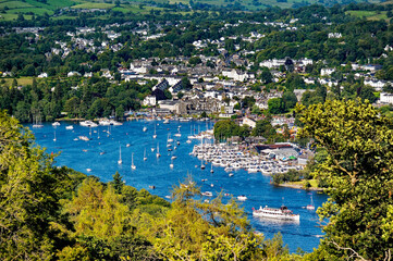 Windermere. Lake District National Park, Cumbria, England. N.E. over Bowness on Windermere boat moorings from above Far Sawrey - obrazy, fototapety, plakaty