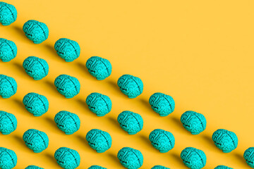 a set of blue brains on a yellow background