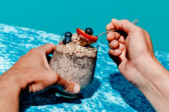 man eating a chia pudding