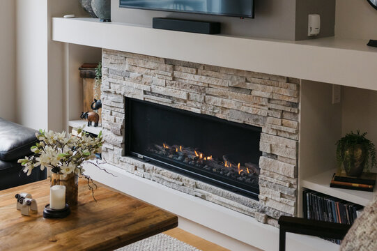 Gas fireplace detail and stone work.