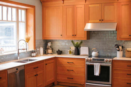 Kitchen with wood cabinets.