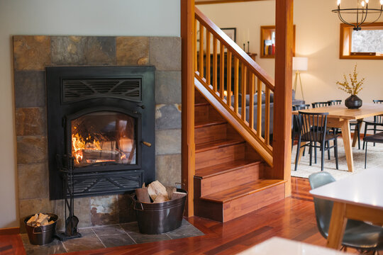 Fireplace and staircase.