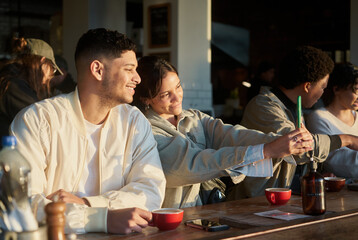 Friends taking a selfie at a restaurant