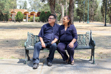 Latin older adult couple shows their love and joy for life while enjoying the afternoon on a park...