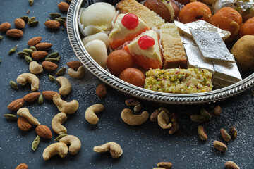 Indian Sweets / Mithai  Tray Kalakand, Rasgulla, Laddoo, 