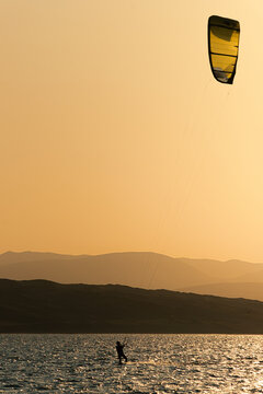 kitesurfing at sunset