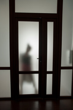 Behind the glass door