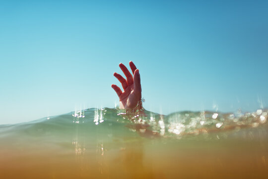 Hand coming out of the sea