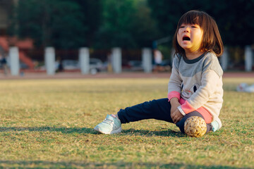 little girl crying outdoor