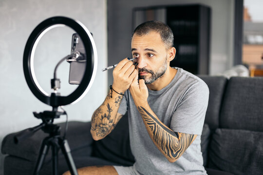 tattooed Man Putting On Makeup
