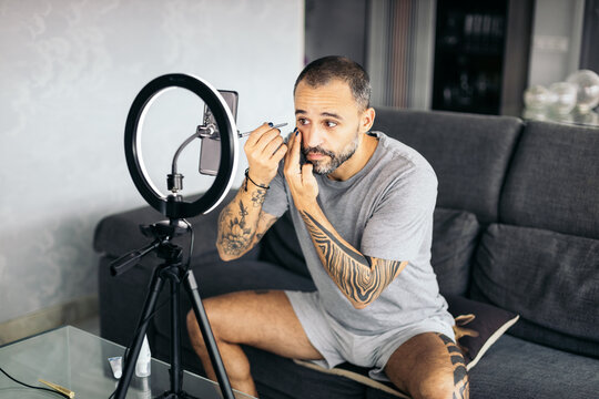 Blogger putting on makeup
