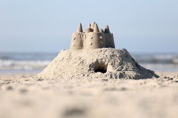 elaborate sandcastle on the beach
