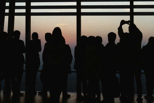 Crowd of tourists watching the sunset