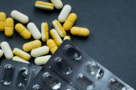 Pills on a gray background 