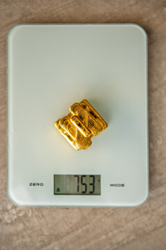 Gold Bars On Scales