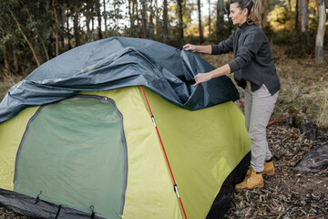 mature woman camping in nature