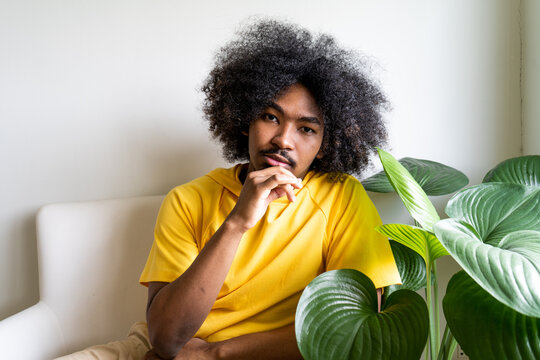 Young guy hangs out at home