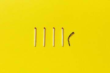 Matches and one burnt match