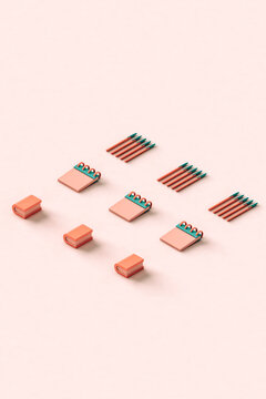 Office supplies organized on a pink background