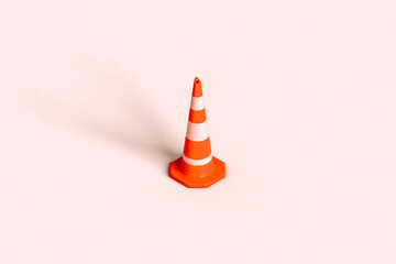 a traffic cone on a pink background. 3d render
