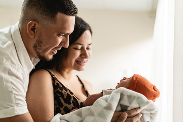 couple with their newborn child