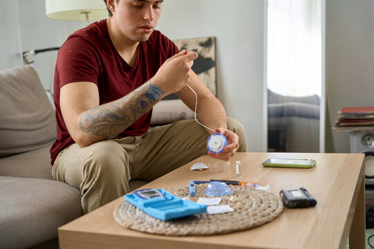 man with diabetes takes a finger blood test and does a routine home