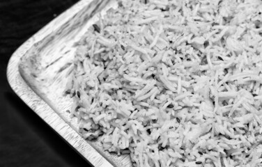 Homemade Indian chicken biryani rice, basmati rice, serving on wooden plate. Traditional food of...