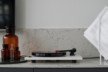 Modern turntable with record playing