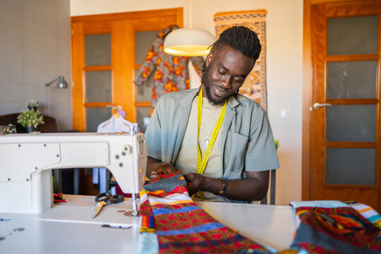 Black Man Working In A Fashion Design Studio.
