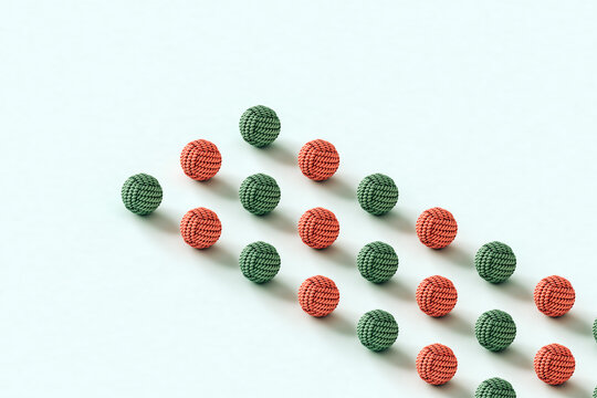 rows of pink and green dog toy balls