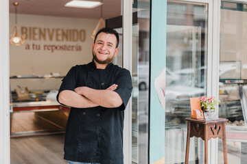 Smiling cake shop owner