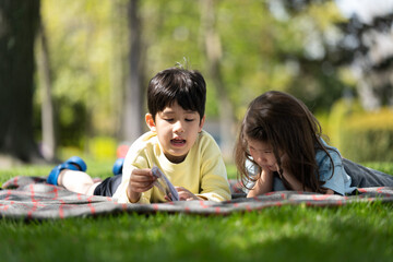Kids reading outside