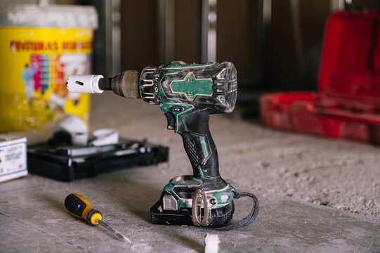 Cordless drill on floor during renovation