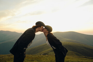 Сouple kiss in the mountains