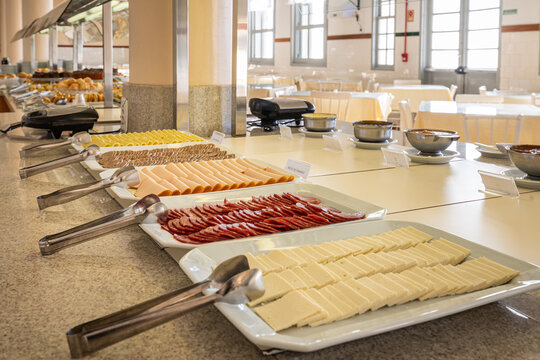 Sausage and cheese products beautifully served on breakfast plates