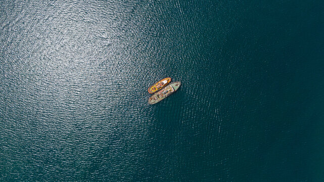 drone view of two tugboats moored together