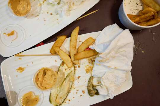 Left Over Chips And Mayo On A Plate At The End Of A Meal