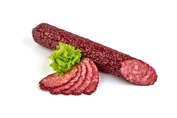 Salami smoked sausage and chopped slices with green lettuce, isolated on white background. High resolution image