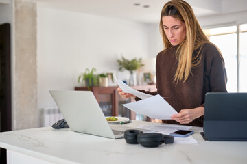 Female manager checking papers