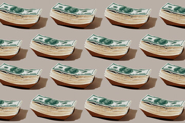 fake dollar bills in some paperboard trays