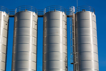 Stainless steel silos in the chemical industry © chitsanupong
