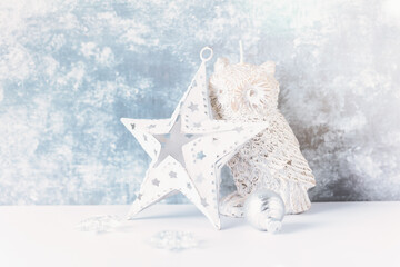Christmas star on bright wooden background. Close up. Copy space.