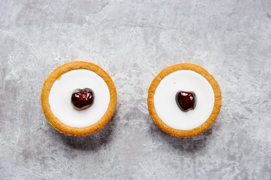 Cherry topped iced tarts