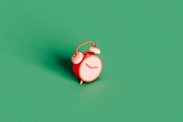 a pink alarm clok. 3d render with copy space.