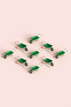 rhombus of green rake and wheelbarrows