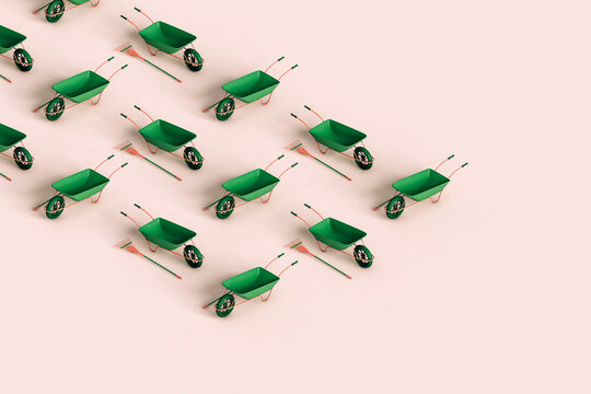rectangle of green rake and wheelbarrow